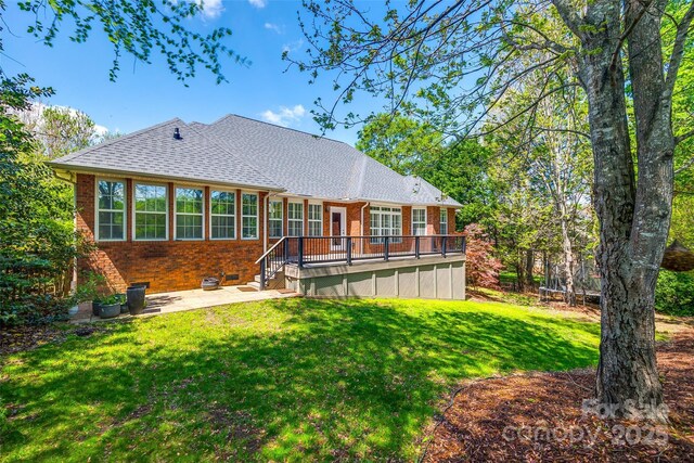 1126 Blowing Rock Cv, Fort Mill, SC 29708 - back of house featuring a patio, a lawn, brick siding, a wooden deck, and a shingled roof