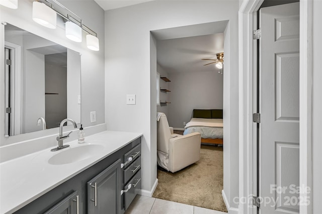212 Short Michigan Ave, Asheville, NC 28806 - bathroom featuring baseboards, a ceiling fan, ensuite bath, vanity, and tile patterned floors
