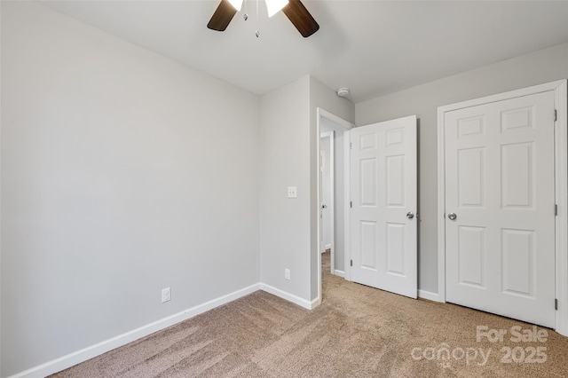 212 Short Michigan Ave, Asheville, NC 28806 - unfurnished bedroom with baseboards, a ceiling fan, and carpet