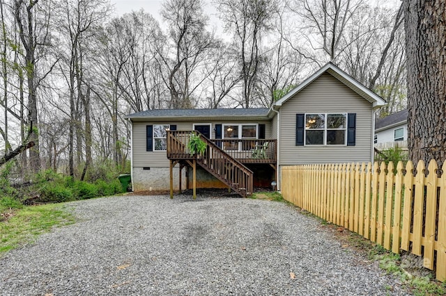 212 Short Michigan Ave, Asheville, NC 28806 - view of front facade featuring crawl space, a wooden deck, fence, and stairway