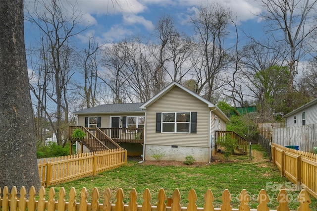 212 Short Michigan Ave, Asheville, NC 28806 - rear view of property with stairs, a deck, a fenced backyard, and a yard