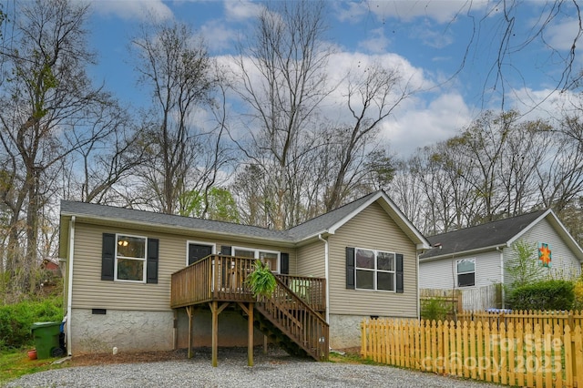 212 Short Michigan Ave, Asheville, NC 28806 - rear view of property with stairway, a deck, fence, and crawl space