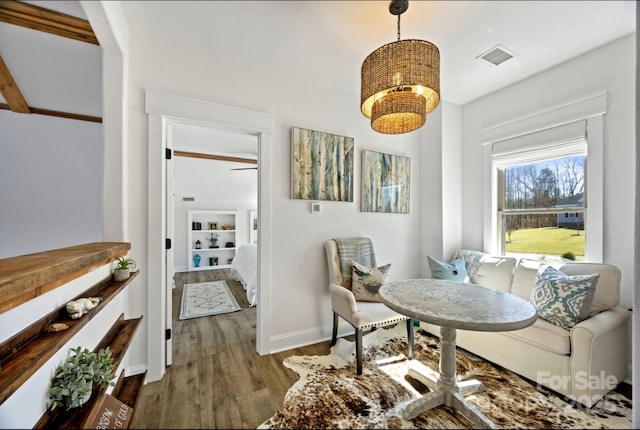5888 Wood Duck Way, Catawba, NC 28609 - dining space featuring wood finished floors, a chandelier, and baseboards