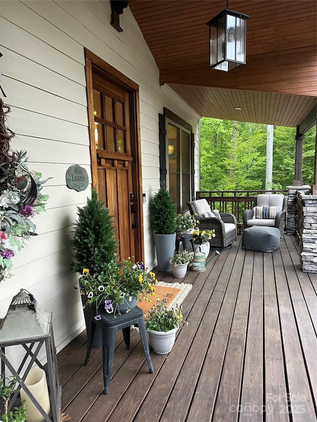 5888 Wood Duck Way, Catawba, NC 28609 - wooden deck featuring covered porch and an outdoor hangout area