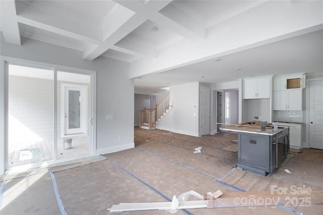 1504 Baileys Run, Gastonia, NC 28056 - kitchen with white cabinets, a center island, tasteful backsplash, coffered ceiling, and beamed ceiling