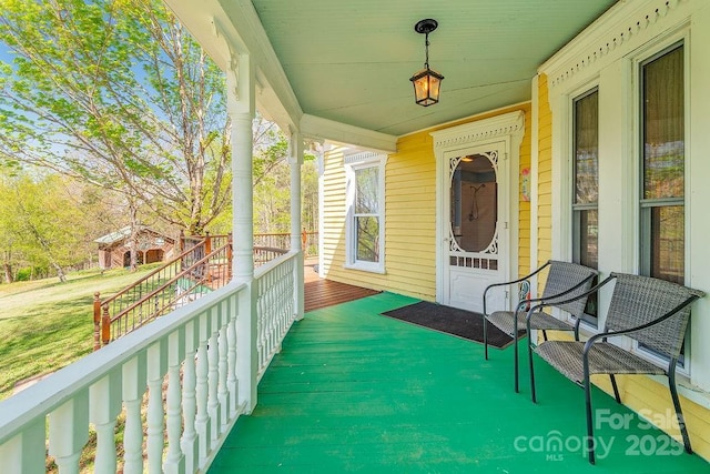balcony featuring covered porch