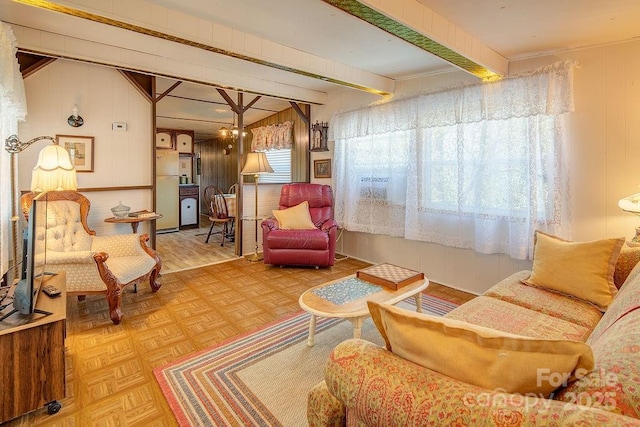 living room featuring wood walls
