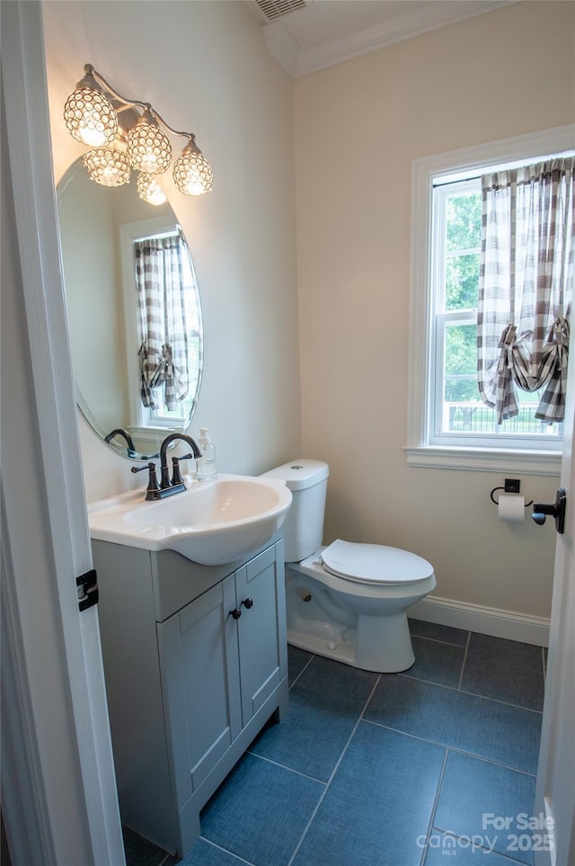 8810 Cool Meadow Dr, Huntersville, NC 28078 - bathroom featuring toilet, vanity, crown molding, and baseboards