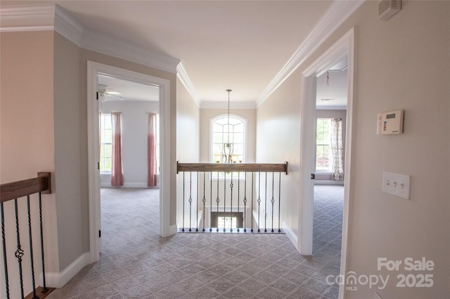 8810 Cool Meadow Dr, Huntersville, NC 28078 - corridor featuring carpet, a chandelier, ornamental molding, baseboards, and an upstairs landing