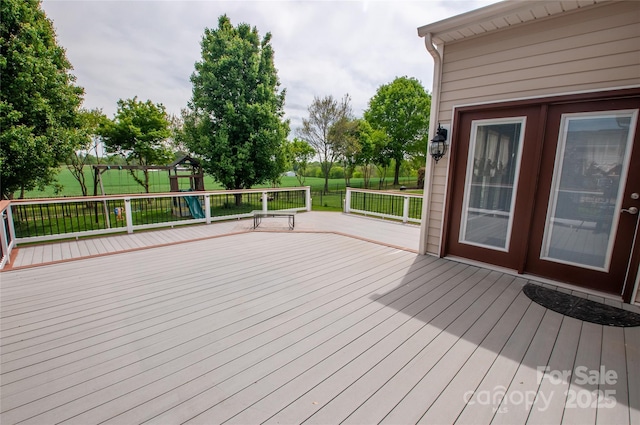 8810 Cool Meadow Dr, Huntersville, NC 28078 - wooden terrace featuring a playground and a lawn