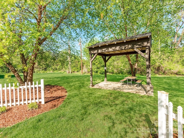 view of yard featuring a patio area and a gazebo