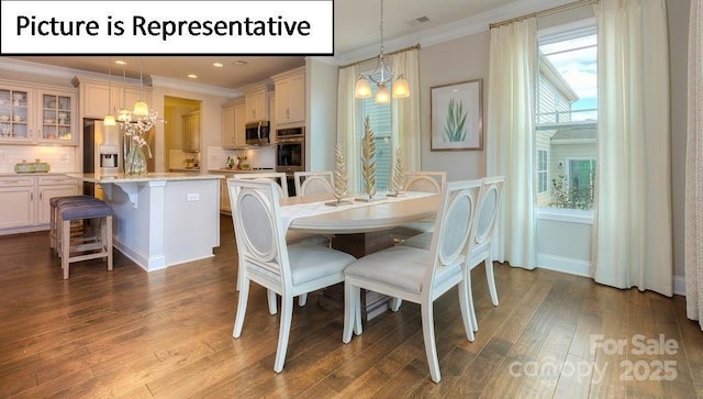 dining room featuring dark wood-style flooring, baseboards, a chandelier, recessed lighting, and crown molding