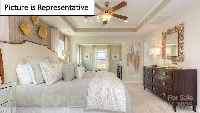 bedroom featuring baseboards, ornamental molding, visible vents, a raised ceiling, and light colored carpet