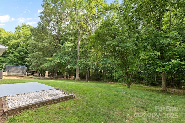 view of yard featuring fence