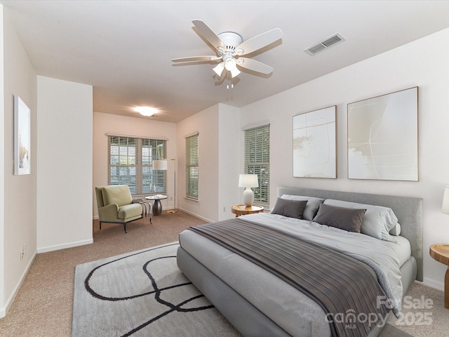 11705 Silverado Ln, Charlotte, NC 28277 - carpeted bedroom with baseboards and a ceiling fan