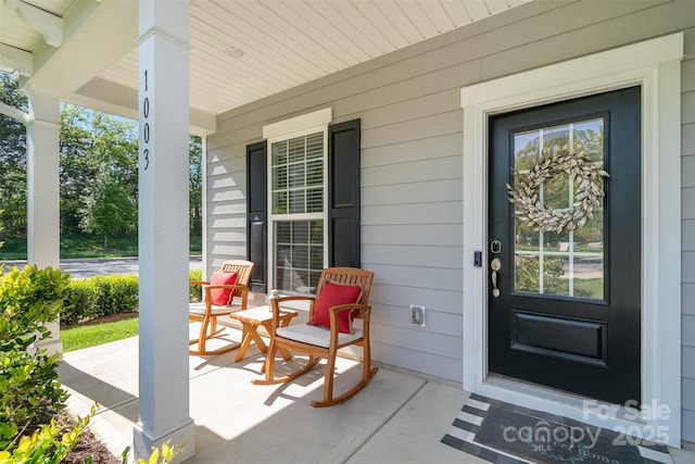 entrance to property with covered porch