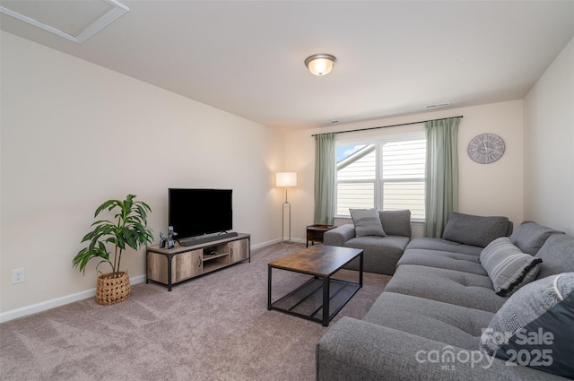 carpeted living room featuring baseboards