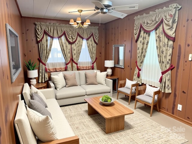 215 Old Dixie Rd, Lancaster, SC 29720 - living area with a ceiling fan, wooden walls, and a chandelier