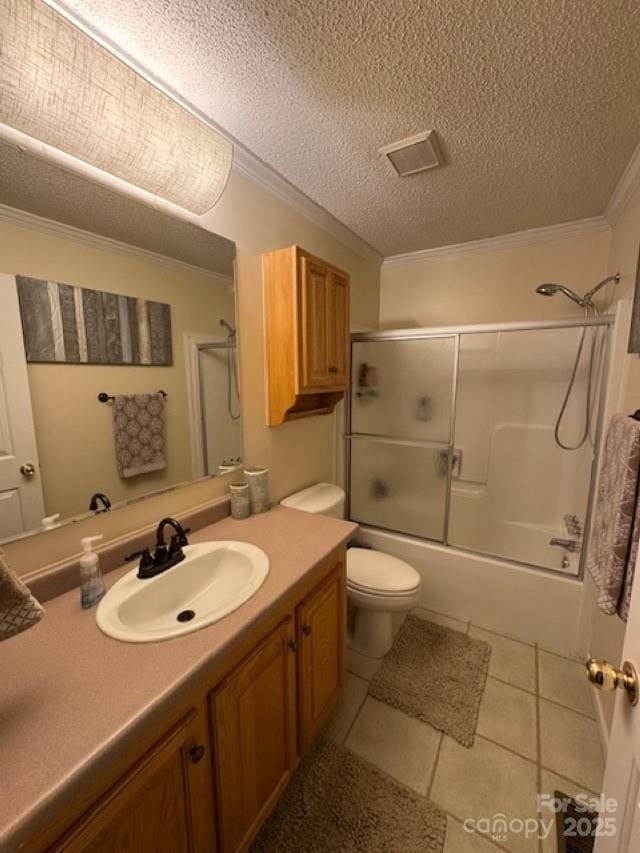 1273 Wateree Estates Rd, Winnsboro, SC 29180 - full bath featuring crown molding, a textured ceiling, vanity, tile patterned flooring, and enclosed tub / shower combo