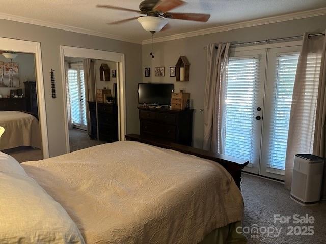 1273 Wateree Estates Rd, Winnsboro, SC 29180 - bedroom featuring ceiling fan, access to exterior, ornamental molding, and carpet floors