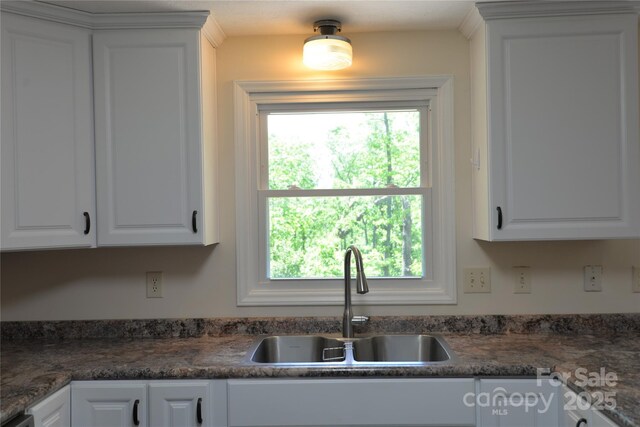 280 Fletcher View Dr, Fletcher, NC 28732 - kitchen featuring a sink, white cabinets, and dark countertops