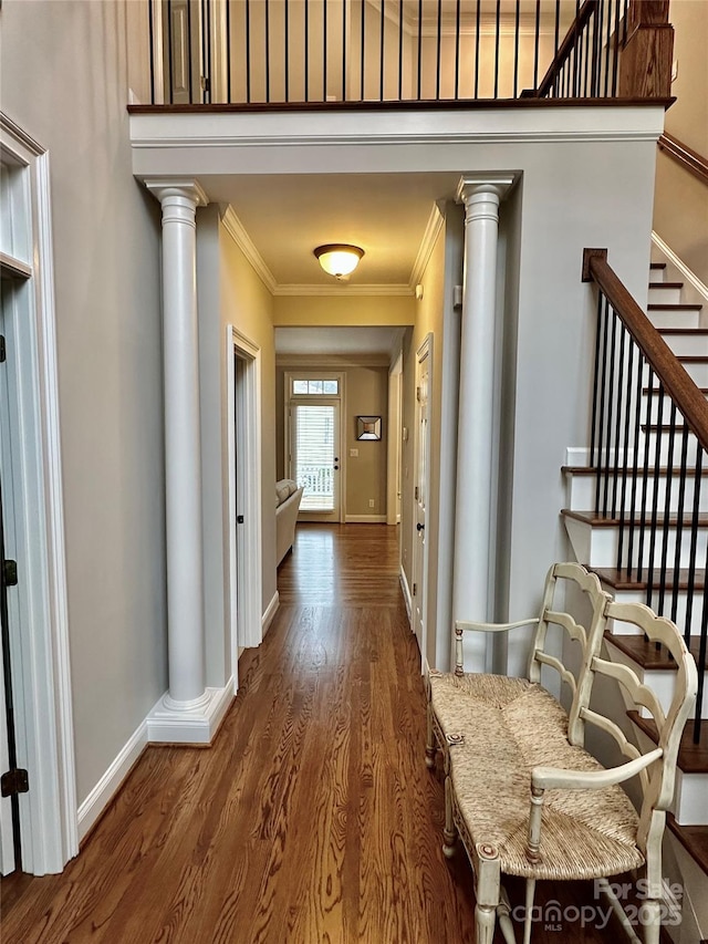 9508 Hayenridge Ct, Huntersville, NC 28078 - hallway with ornamental molding, baseboards, decorative columns, and wood finished floors