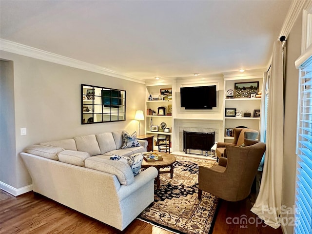 9508 Hayenridge Ct, Huntersville, NC 28078 - living room featuring baseboards, built in shelves, a high end fireplace, crown molding, and wood finished floors
