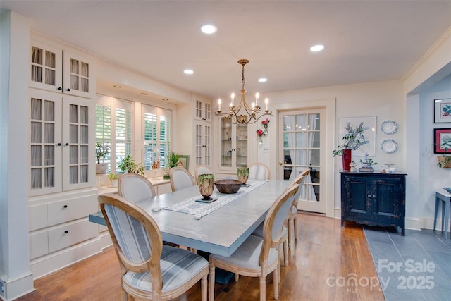 1473 12th Street Dr NW, Hickory, NC 28601 - dining space featuring french doors, a chandelier, recessed lighting, and wood finished floors