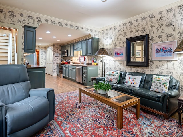 11 Bourne Ln, Asheville, NC 28803 - living area with ornamental molding, recessed lighting, light wood finished floors, and wallpapered walls