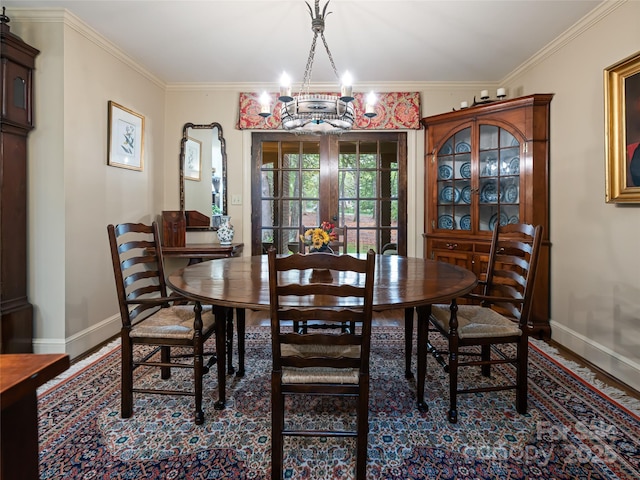 11 Bourne Ln, Asheville, NC 28803 - dining room with wood finished floors, a chandelier, and baseboards