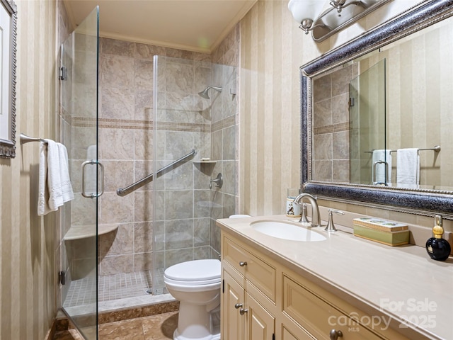 11 Bourne Ln, Asheville, NC 28803 - bathroom featuring toilet, vanity, a shower stall, and wallpapered walls