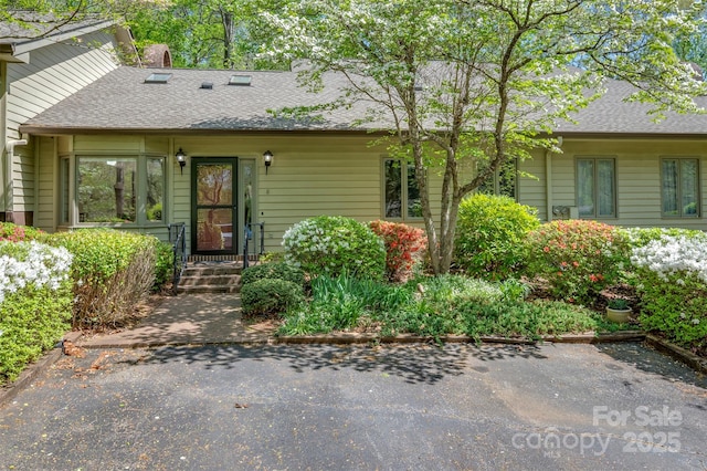 8 Hunting Country Trl, Tryon, NC 28782 - view of front of property with roof with shingles and a chimney