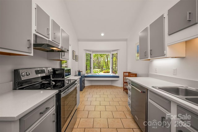 8 Hunting Country Trl, Tryon, NC 28782 - kitchen with stainless steel appliances, under cabinet range hood, gray cabinetry, and recessed lighting