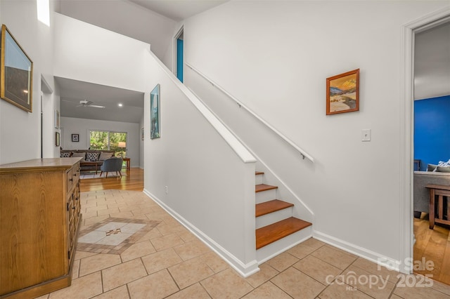 8 Hunting Country Trl, Tryon, NC 28782 - stairway featuring tile patterned floors, a ceiling fan, and baseboards