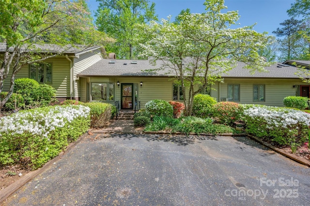 8 Hunting Country Trl, Tryon, NC 28782 - view of front facade featuring roof with shingles