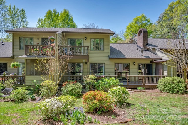 8 Hunting Country Trl, Tryon, NC 28782 - back of property with roof with shingles, a balcony, and a chimney