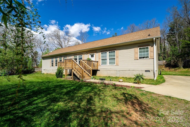 view of front facade with stairway, crawl space, a front yard, and a deck