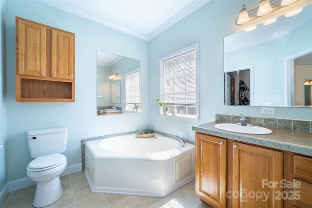 bathroom with toilet, vanity, ornamental molding, a bath, and baseboards