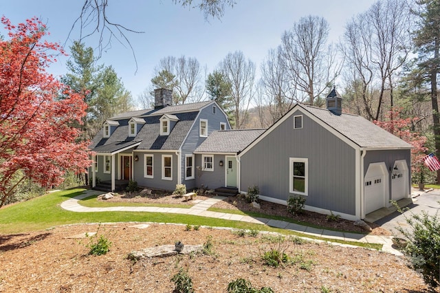 dutch colonial with roof with shingles, a gambrel roof, and a chimney