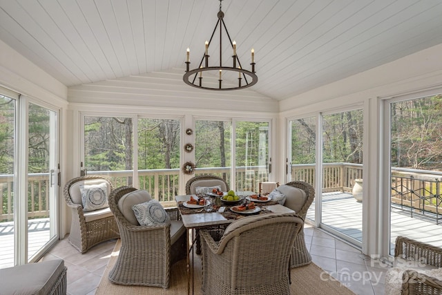 sunroom / solarium with an inviting chandelier and plenty of natural light