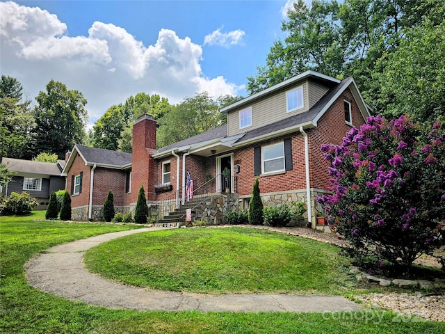 317 Balsam Dr, Waynesville, NC 28786 - view of front of property with a shingled roof, brick siding, a chimney, and a front lawn