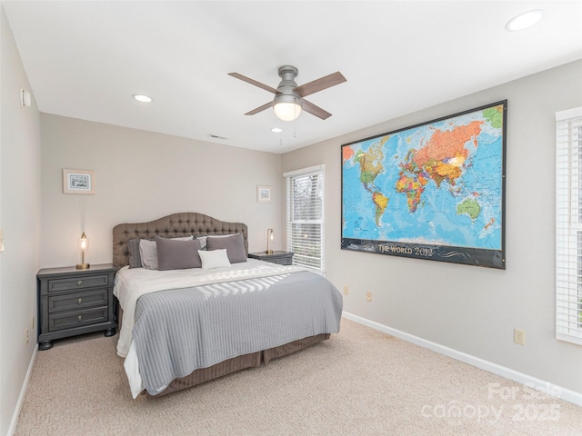 carpeted bedroom with recessed lighting, visible vents, baseboards, and a ceiling fan