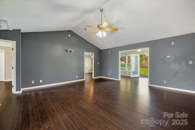 unfurnished living room featuring baseboards, vaulted ceiling, a textured ceiling, a ceiling fan, and wood finished floors