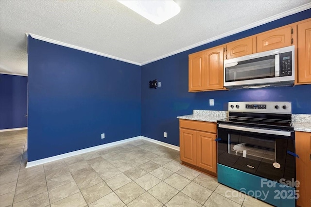 kitchen featuring stainless steel microwave, baseboards, a textured ceiling, electric range, and crown molding