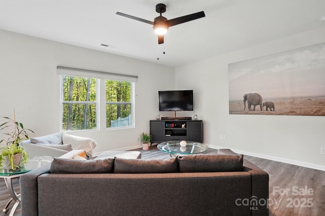 11040 E Lake Rd, Charlotte, NC 28215 - living room with visible vents, baseboards, a ceiling fan, and wood finished floors
