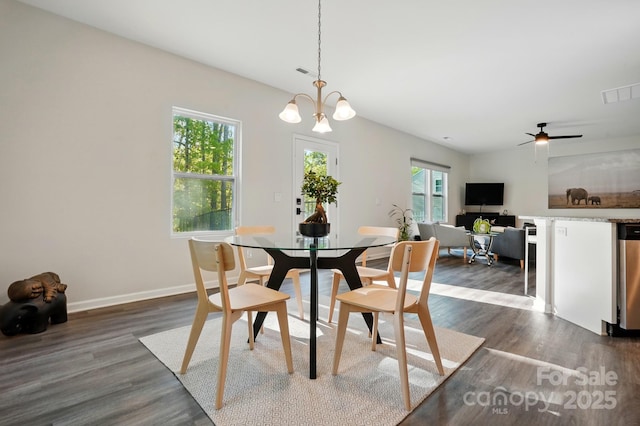 11040 E Lake Rd, Charlotte, NC 28215 - dining space with visible vents, baseboards, ceiling fan with notable chandelier, and dark wood finished floors