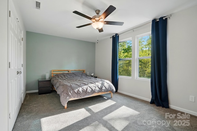 11040 E Lake Rd, Charlotte, NC 28215 - bedroom featuring visible vents, baseboards, ceiling fan, and carpet