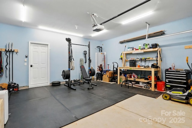 11040 E Lake Rd, Charlotte, NC 28215 - workout area featuring a garage and water heater