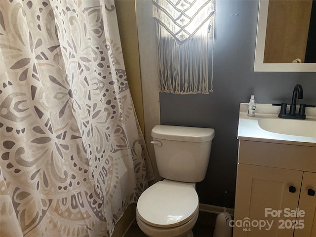 1798 Lonnie Shuffler St, Morganton, NC 28655 - full bath featuring toilet, vanity, baseboards, and a shower with curtain