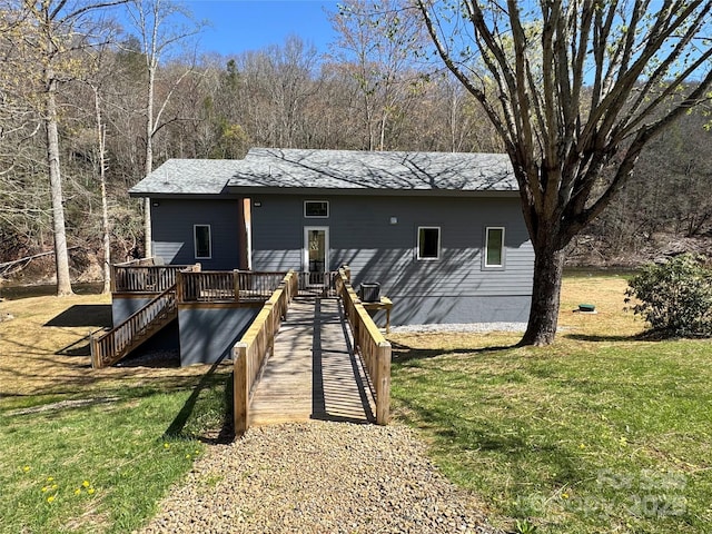 8061 State Highway 80 S, Burnsville, NC 28714 - rear view of property with stairs, a deck, and a lawn